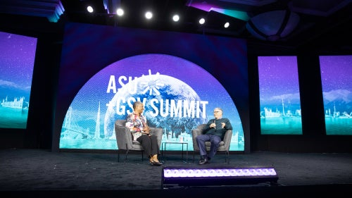 Bill Gates and Jessie Woolley-Wilson on stage at the ASU+GSV Summit